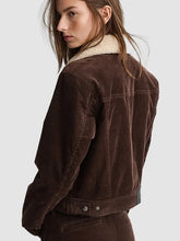 Brown-cropped-jacket-with-buttoned-cuffs