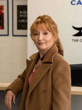 Lesley-Manville-coat-featuring-a-classic-lapel-collar