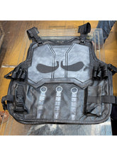 Black leather Punisher vest with gray skull plate, knife graphics and side pouches