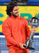 Japan-Open-2026-Carlos-Alcaraz-orange-track-jacket
