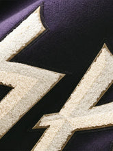 Front-view-of-the-Nike-Vikings-2026-varsity-jacket
