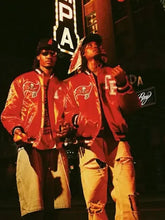 Red-fabric-jacket-with-buttoned-closure