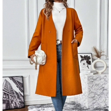 Anatomy of a Scandal Sophie Whitehouse Orange Coat